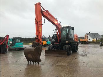 Wheel excavator 2009 Hitachi ZX140W-3