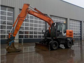 Wheel excavator 2010 Hitachi ZX140W-3