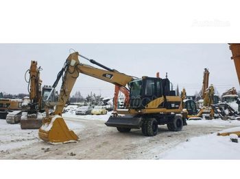 Wheel excavator CATERPILLAR M 313 D