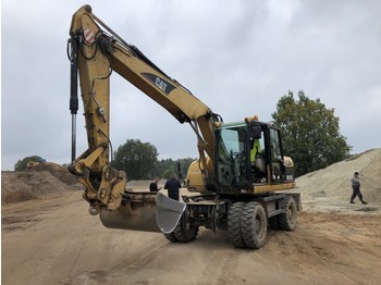 Wheel excavator Caterpillar M313C