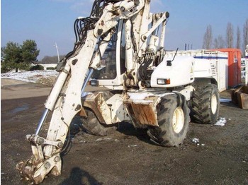 MECALAC 12MXT - Wheel excavator