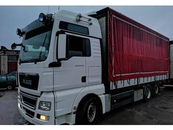 Curtainsider truck MAN TGX 26.400 6X2-2LL EURO 5: picture 1