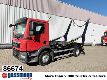 Skip loader truck MAN TGM