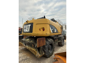 Wheel excavator CATERPILLAR 313D