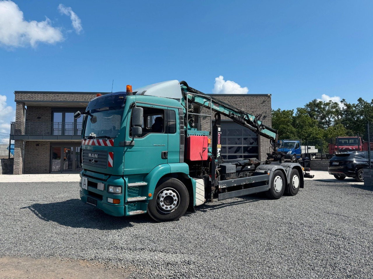 MAN TGA 26.360 Kran TeRex Multilift Fernbedienung - Hook lift truck, Crane truck: picture 2 MAN TGA 26.360 Kran TeRex Multilift Fernbedienung - Hook lift truck, Crane truck: picture 2