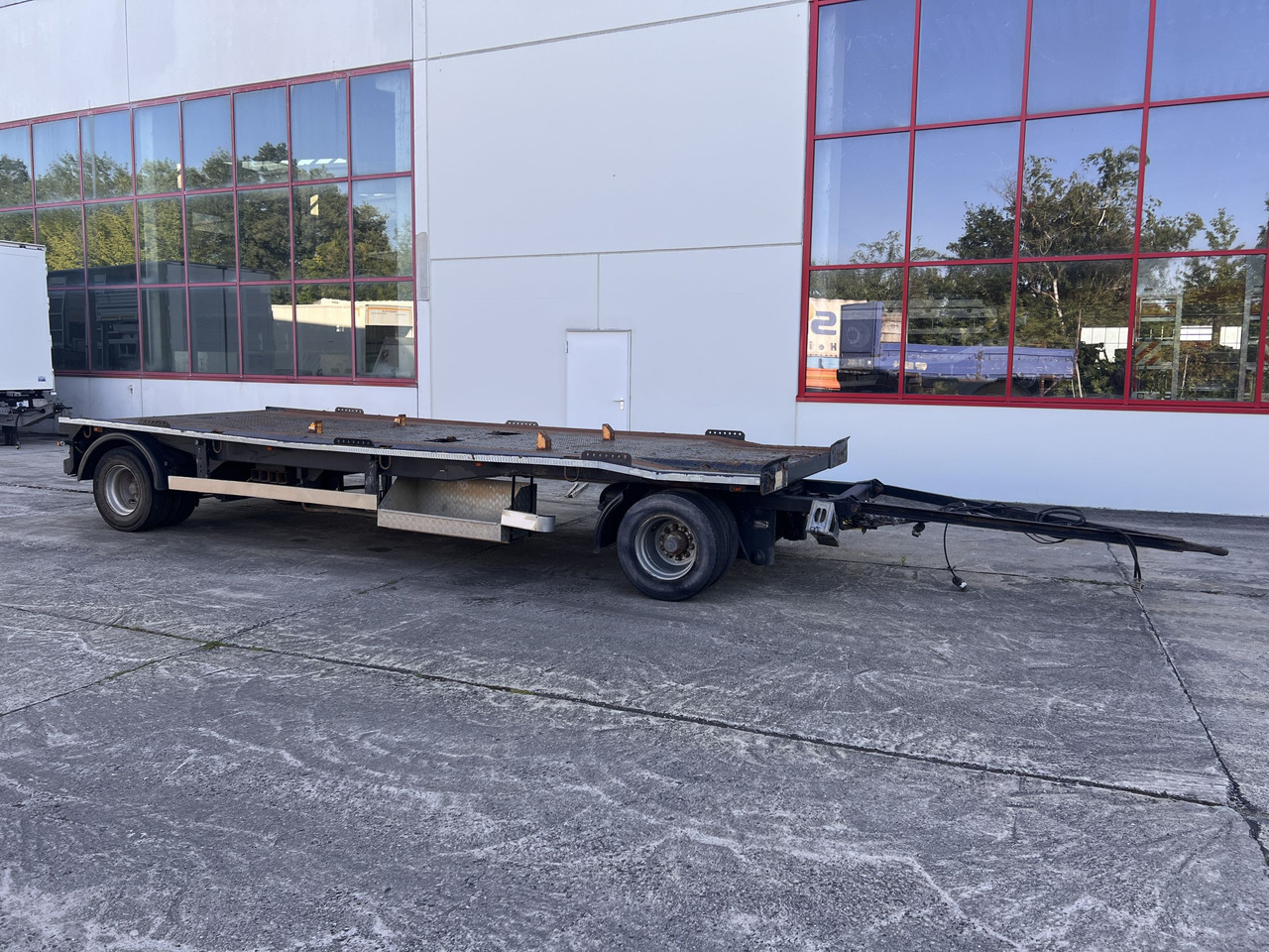 Dinkel DAC 18000 2 Achs Kombi- Anhänger für Abroll- oder Absetzmulden oder Tieflader - Roll-off/ Skip trailer: picture 1 Dinkel DAC 18000 2 Achs Kombi- Anhänger für Abroll- oder Absetzmulden oder Tieflader - Roll-off/ Skip trailer: picture 1