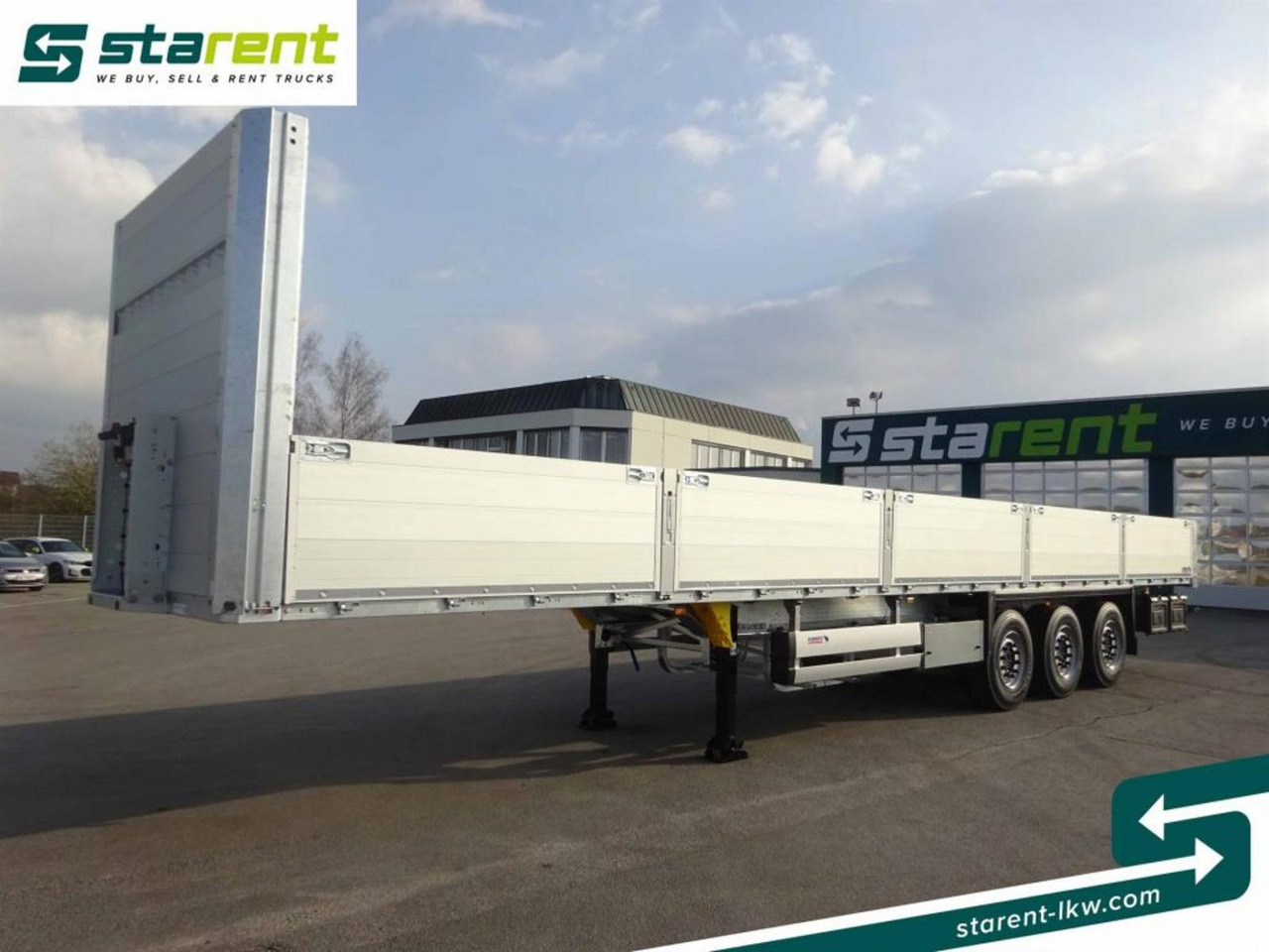 Schmitz Baustofftrailer Liftachse Rungen 80cm Bordwände - Dropside/ Flatbed semi-trailer: picture 1 Schmitz Baustofftrailer Liftachse Rungen 80cm Bordwände - Dropside/ Flatbed semi-trailer: picture 1