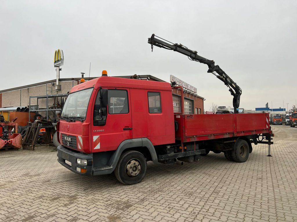 MAN LE 12.225 LC Pritsche Heckkran 6 Zylinder Doka Topzust - Dropside/ Flatbed truck, Crane truck: picture 1 MAN LE 12.225 LC Pritsche Heckkran 6 Zylinder Doka Topzust - Dropside/ Flatbed truck, Crane truck: picture 1