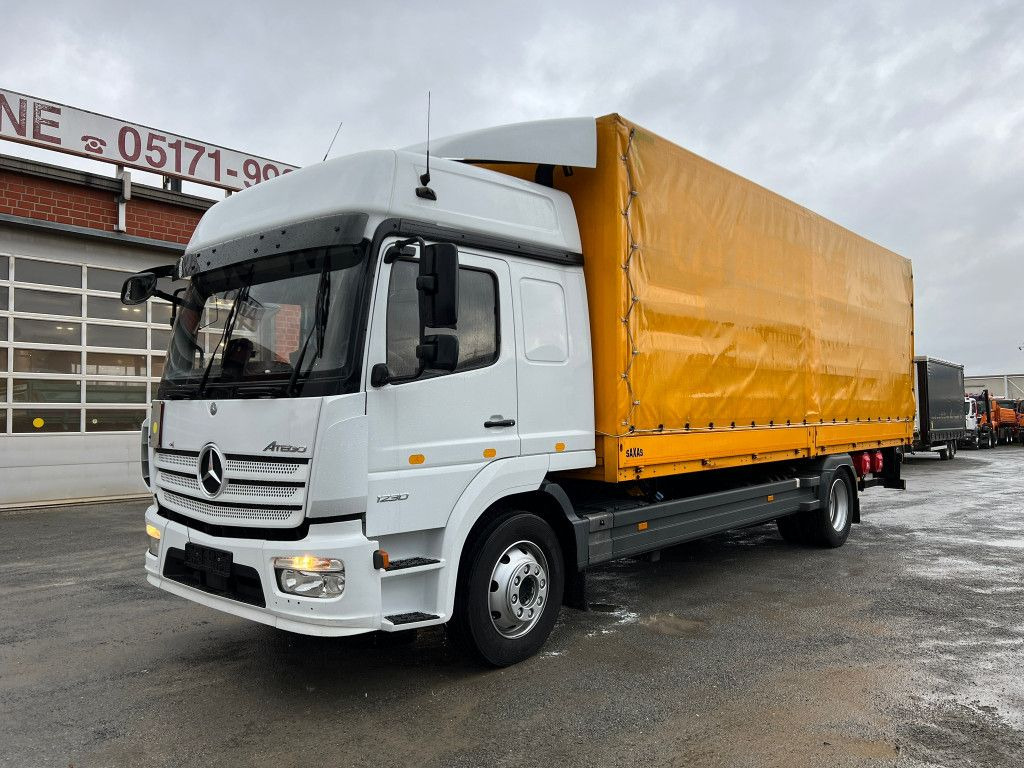 Mercedes-Benz Atego 1230 L Pritsche LBW Lg.Fhs/Hochd. 7,2m+LBW - Curtainsider truck: picture 1 Mercedes-Benz Atego 1230 L Pritsche LBW Lg.Fhs/Hochd. 7,2m+LBW - Curtainsider truck: picture 1