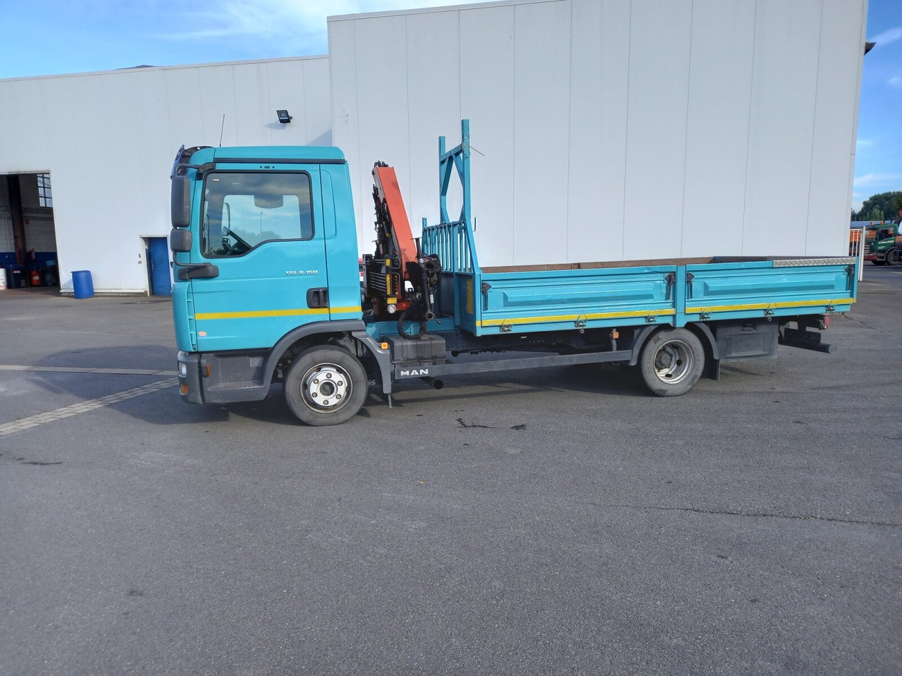 MAN TGL TS 754 F - Dropside/ Flatbed truck: picture 1 MAN TGL TS 754 F - Dropside/ Flatbed truck: picture 1