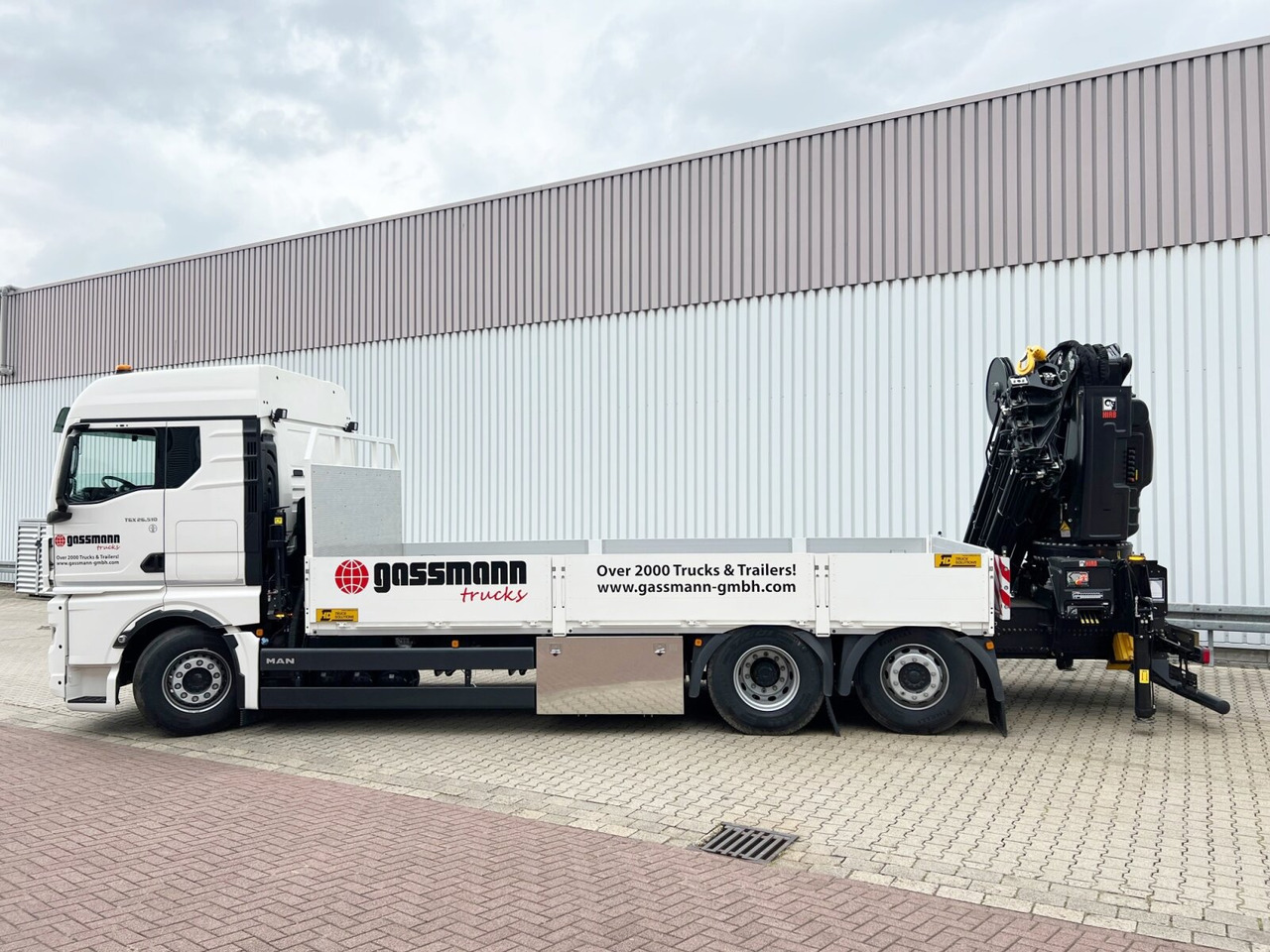 MAN TGX 26.510 6x2-4 LL CH TGX 26.510 6x2-4 LL, Kran Hiab X-HiPro 548 E-8, Lenk-/Liftachse, TwistLock 20Fuß, Funk, Retarder - Crane truck, Dropside/ Flatbed truck: picture 2 MAN TGX 26.510 6x2-4 LL CH TGX 26.510 6x2-4 LL, Kran Hiab X-HiPro 548 E-8, Lenk-/Liftachse, TwistLock 20Fuß, Funk, Retarder - Crane truck, Dropside/ Flatbed truck: picture 2