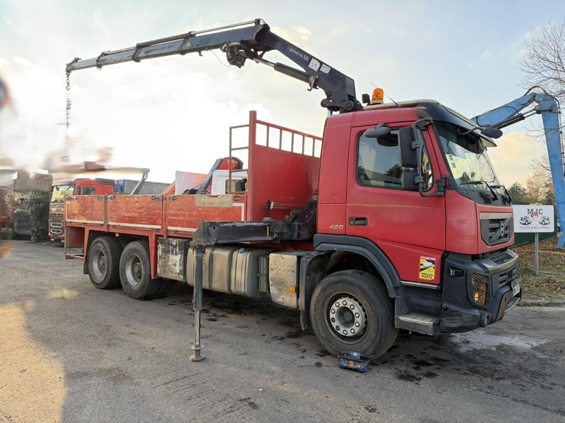 Volvo FMX 420 6X4 PRITSCHE + KRAN HMF 1720 + winch + radio - BIG AXLES / HUB REDUCTION - STEEL SPRING / BLATT - PLATFORM 6m10 - Dropside/ Flatbed truck, Crane truck: picture 1 Volvo FMX 420 6X4 PRITSCHE + KRAN HMF 1720 + winch + radio - BIG AXLES / HUB REDUCTION - STEEL SPRING / BLATT - PLATFORM 6m10 - Dropside/ Flatbed truck, Crane truck: picture 1