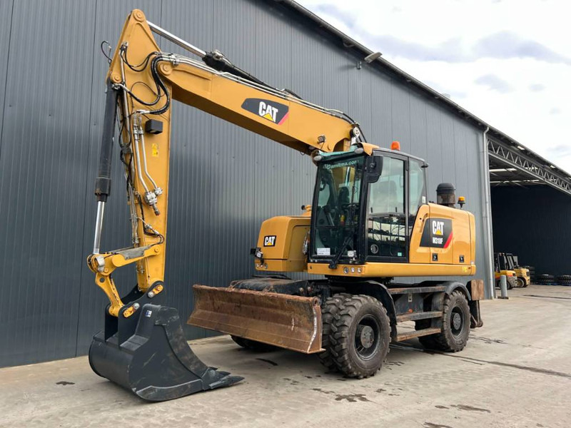 Wheel excavator Cat M318F: picture 1