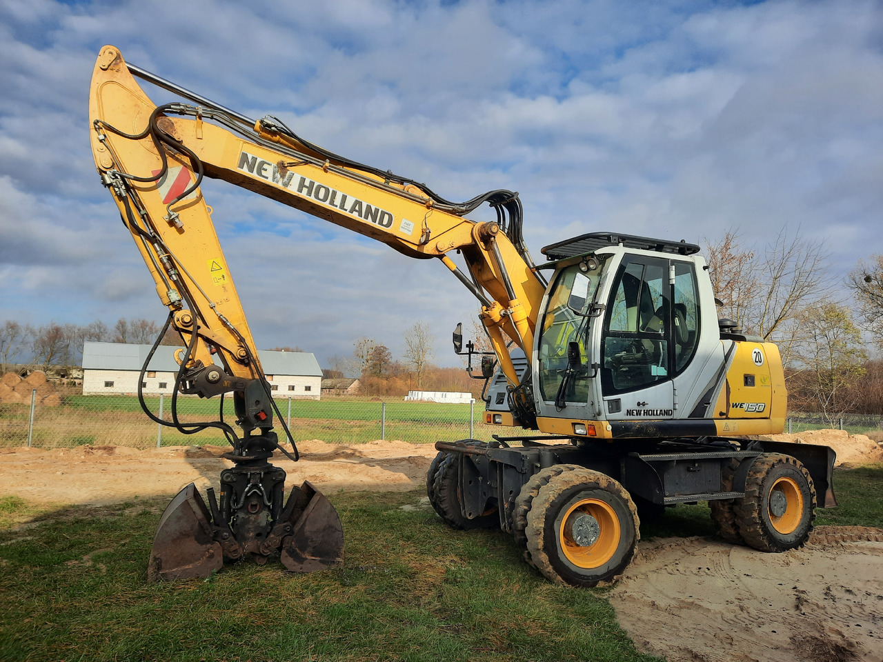 NEW HOLLAND WE150C - Wheel excavator: picture 1 NEW HOLLAND WE150C - Wheel excavator: picture 1