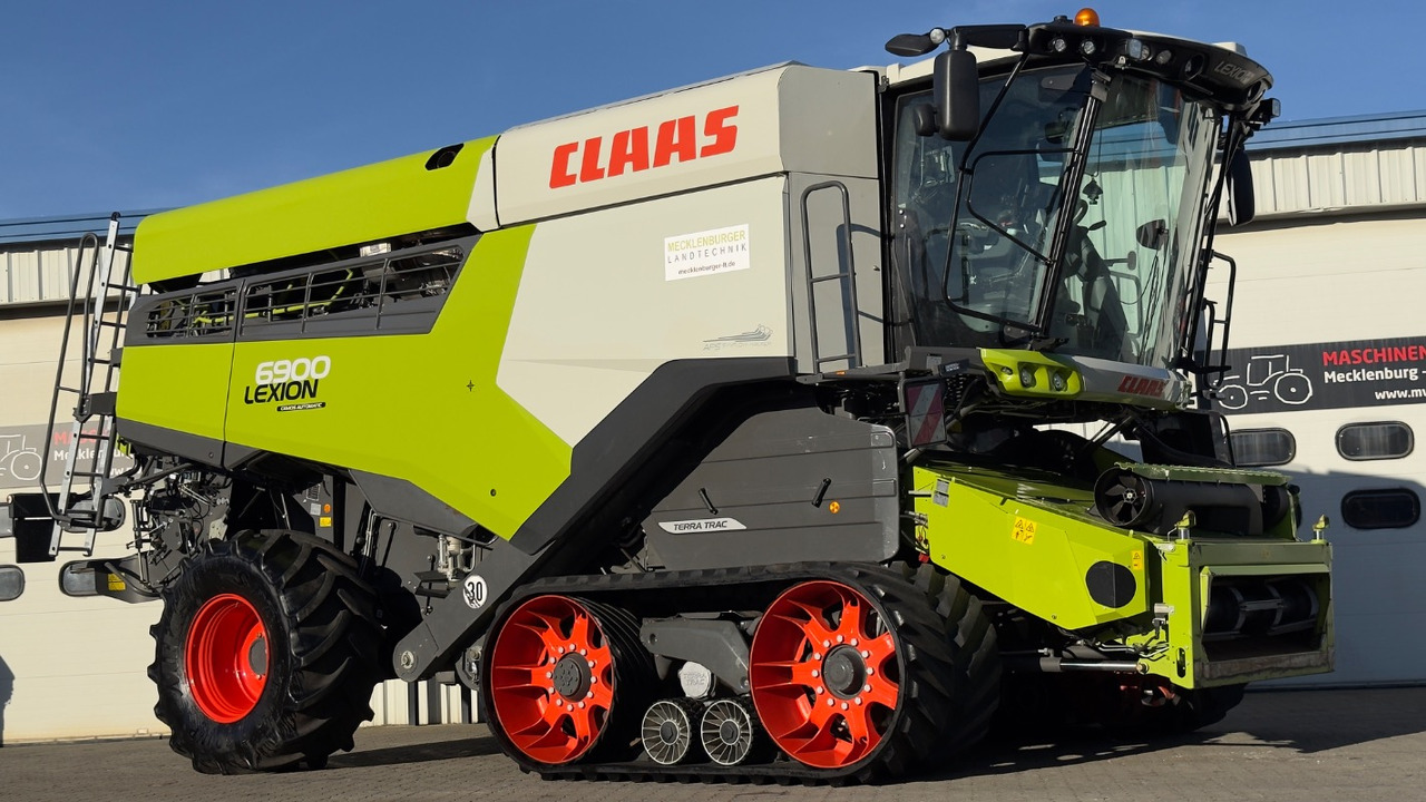 CLAAS Lexion 6900 TerraTrac 890 full Options - Combine harvester: picture 1 CLAAS Lexion 6900 TerraTrac 890 full Options - Combine harvester: picture 1