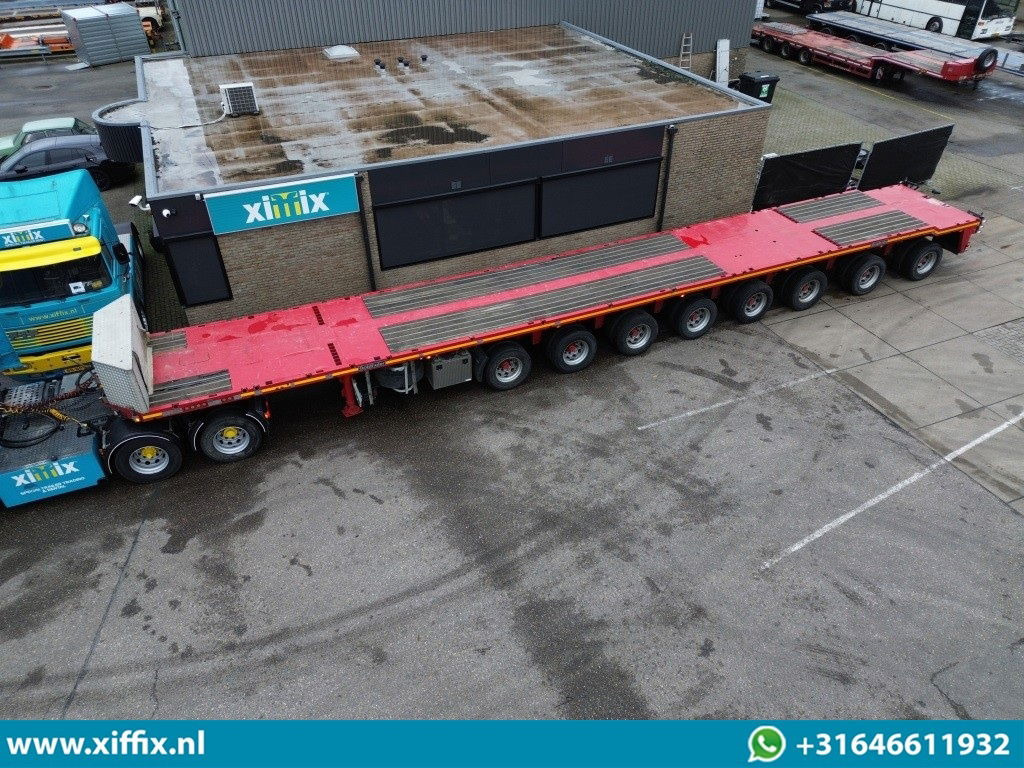 Goldhofer 8-ass. Vlakke oplegger / 7x gestuurd - Dropside/ Flatbed semi-trailer: picture 1 Goldhofer 8-ass. Vlakke oplegger / 7x gestuurd - Dropside/ Flatbed semi-trailer: picture 1