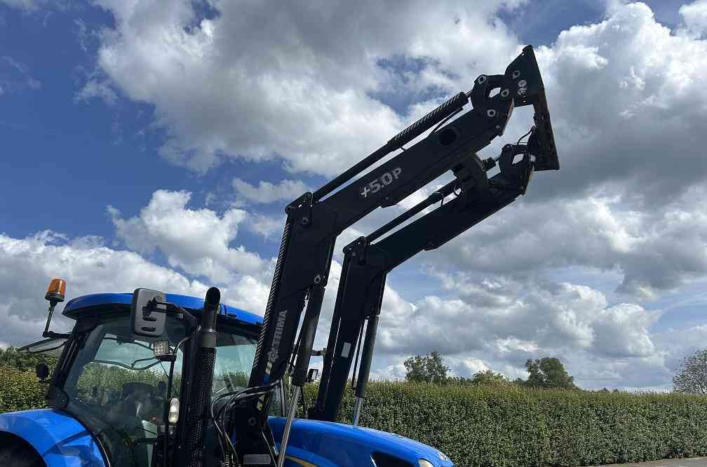 New Holland TSA 125, frontlader - Farm tractor: picture 5 New Holland TSA 125, frontlader - Farm tractor: picture 5