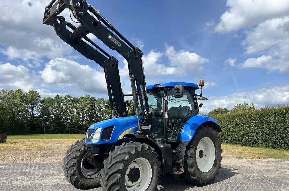 New Holland TSA 125, frontlader - Farm tractor: picture 1 New Holland TSA 125, frontlader - Farm tractor: picture 1