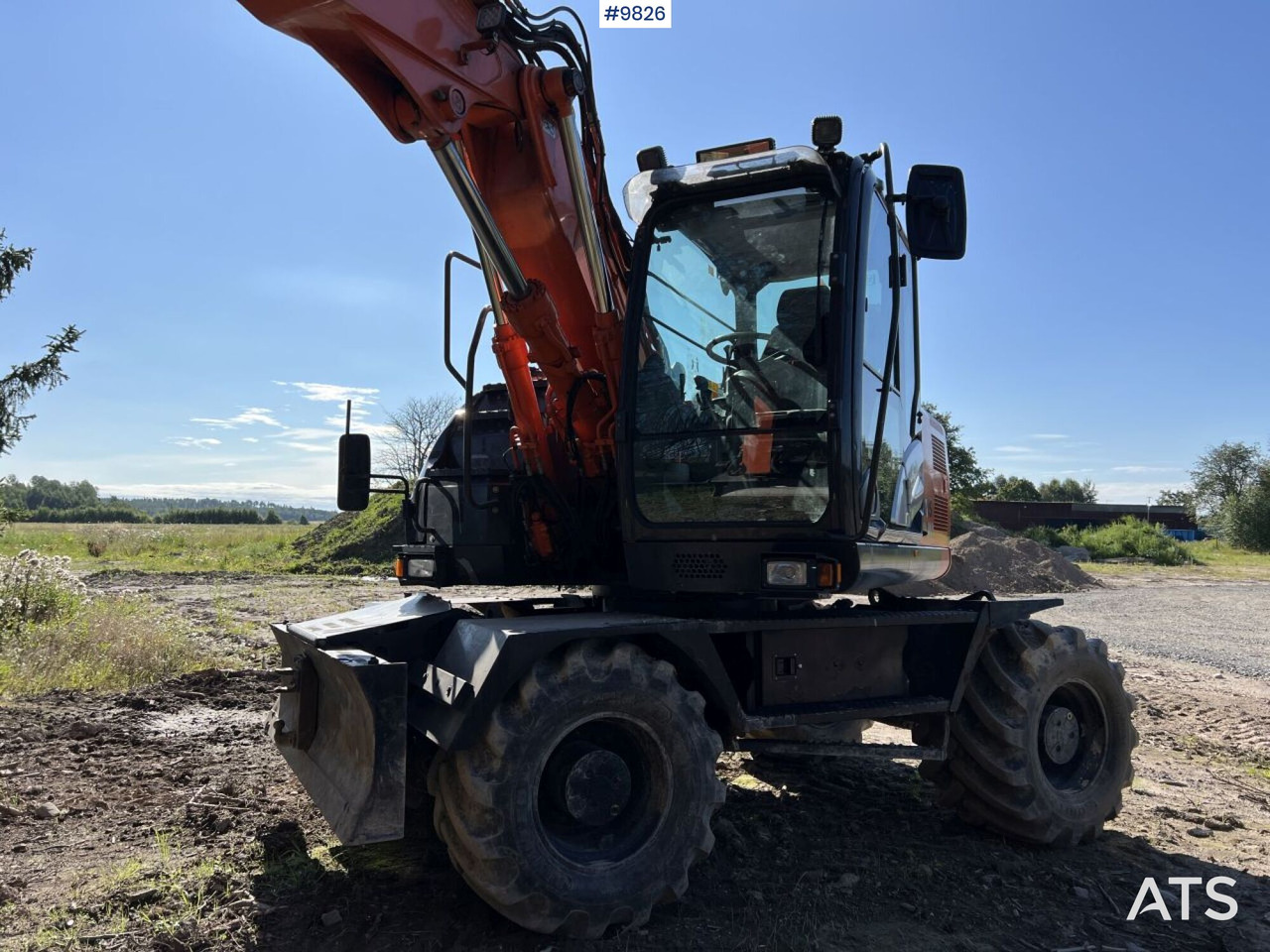 Hitachi ZX140 W-5B with rotor and planer bucket - Wheel excavator: picture 3 Hitachi ZX140 W-5B with rotor and planer bucket - Wheel excavator: picture 3