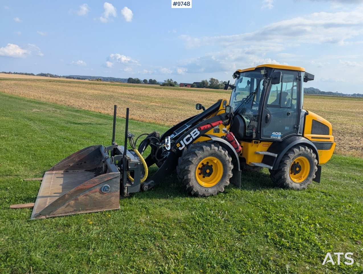 Wheel loader JCB 409 Stage V Nordic Edition 40km/h with attachments - Wheel loader: picture 1 Wheel loader JCB 409 Stage V Nordic Edition 40km/h with attachments - Wheel loader: picture 1