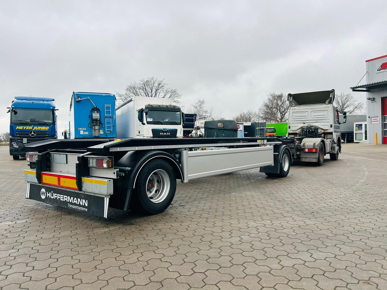 Hüffermann HAR 20.70 LS Aussenrollen Anhänger Sofort Verfüg - Roll-off/ Skip trailer: picture 2 Hüffermann HAR 20.70 LS Aussenrollen Anhänger Sofort Verfüg - Roll-off/ Skip trailer: picture 2