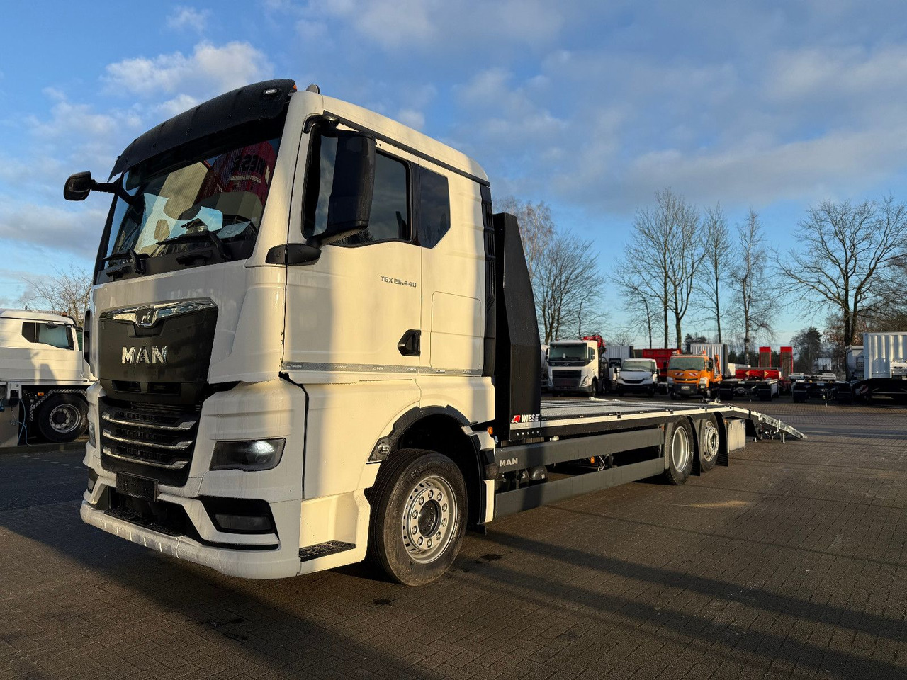 MAN Baumaschinen- Arbeitsbühnentransporter Rampen - Dropside/ Flatbed truck: picture 5 MAN Baumaschinen- Arbeitsbühnentransporter Rampen - Dropside/ Flatbed truck: picture 5