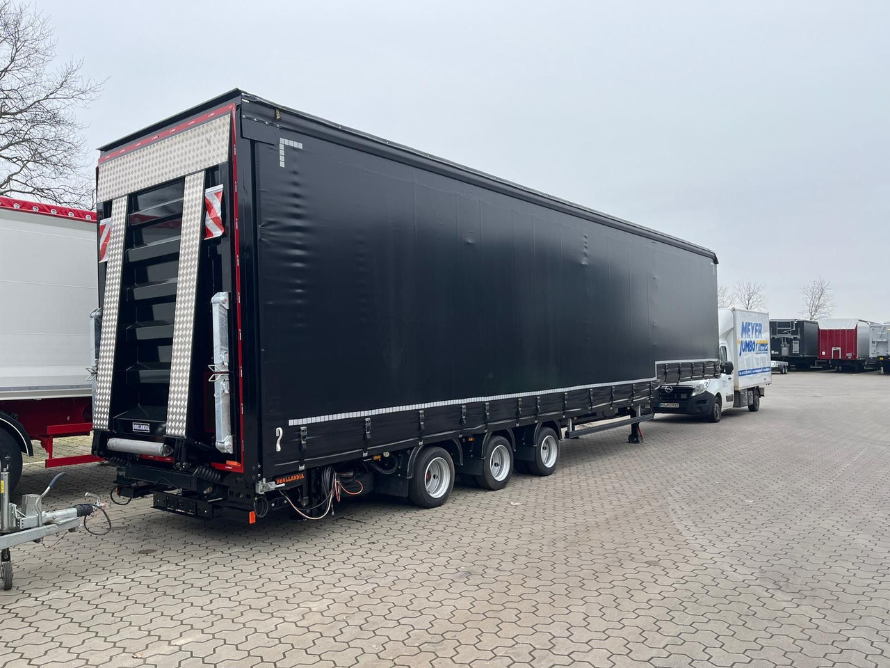 Wiese Gabelstaplertransporter Mega mit Rampen - Low loader semi-trailer: picture 1 Wiese Gabelstaplertransporter Mega mit Rampen - Low loader semi-trailer: picture 1