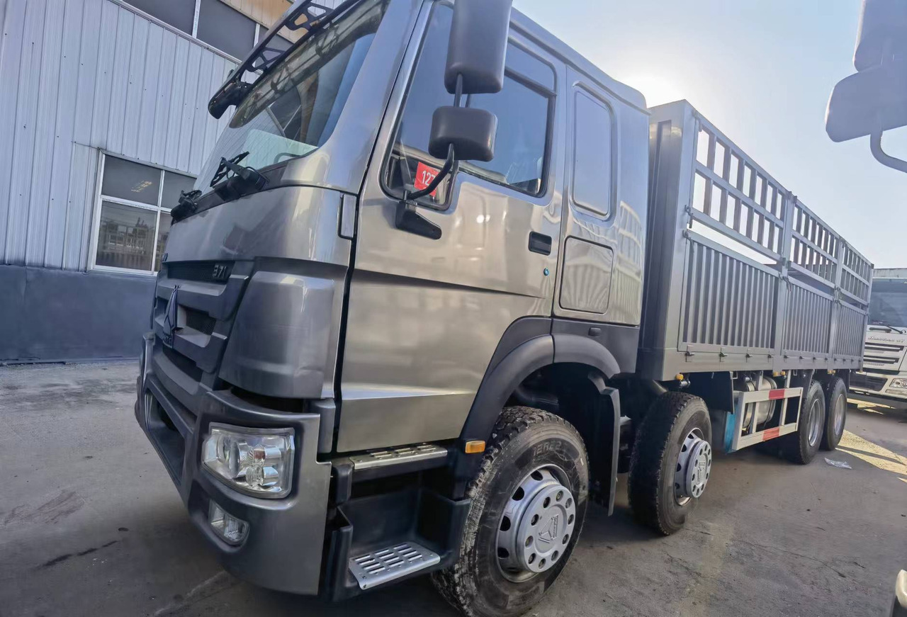 Dropside/ Flatbed truck Sinotruk HOWO 371 8*4 Fence truck: picture 7 Dropside/ Flatbed truck Sinotruk HOWO 371 8*4 Fence truck: picture 7