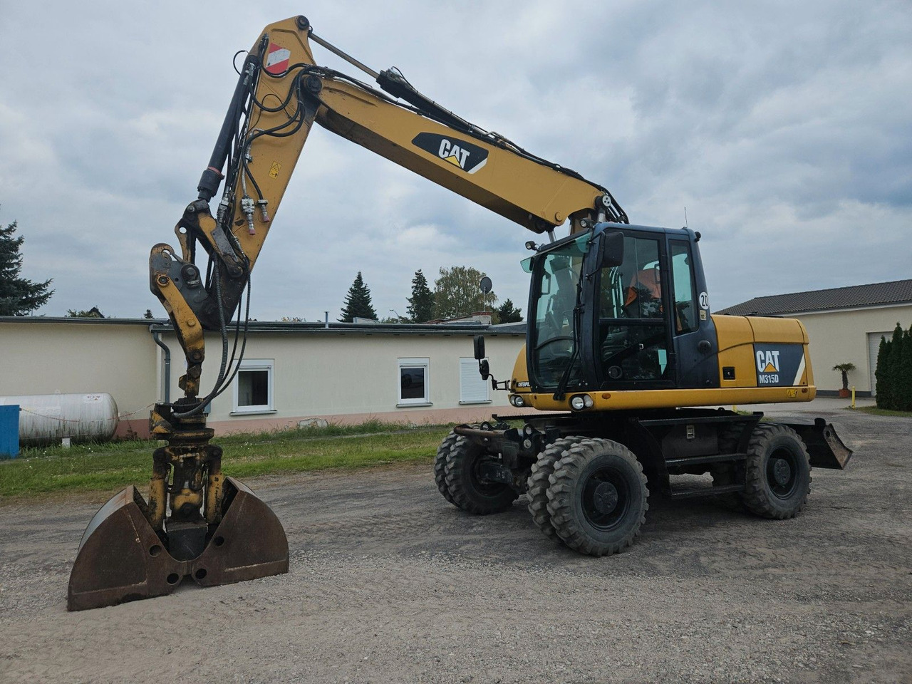 CAT M315D Mobilbagger orig. 4.080h ! 3 Anbauteile - Wheel excavator: picture 1 CAT M315D Mobilbagger orig. 4.080h ! 3 Anbauteile - Wheel excavator: picture 1