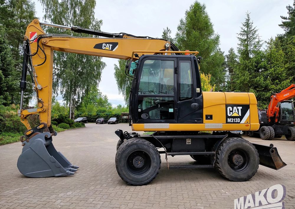 Caterpillar M313D - Wheel excavator: picture 1 Caterpillar M313D - Wheel excavator: picture 1