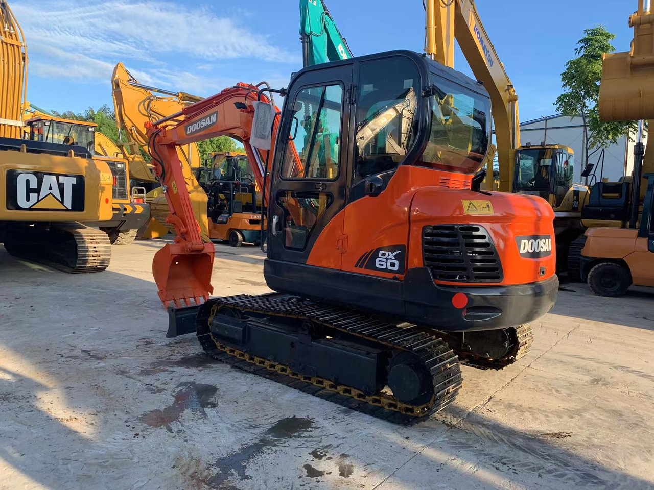 Doosan Doosan Excavator DX60 Yanmar Engine, 37.9 kW (51 HP) Engine, 0.21 m³ Bucket Capacity, 5,700 kg Operating Weight & Dimensions - Mini excavator: picture 2 Doosan Doosan Excavator DX60 Yanmar Engine, 37.9 kW (51 HP) Engine, 0.21 m³ Bucket Capacity, 5,700 kg Operating Weight & Dimensions - Mini excavator: picture 2