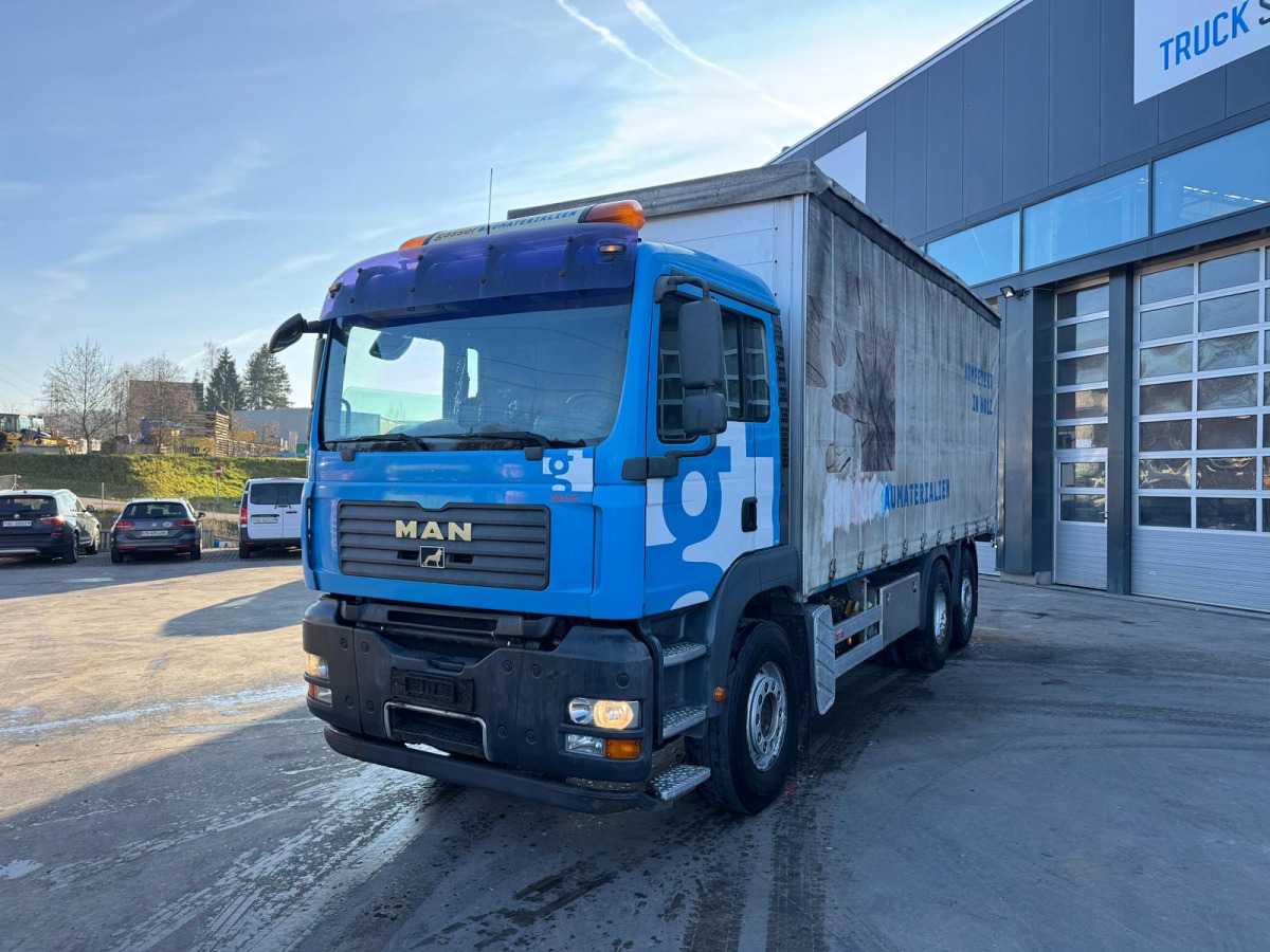 MAN TGA 26.440 6x2 - Curtainsider truck: picture 1 MAN TGA 26.440 6x2 - Curtainsider truck: picture 1