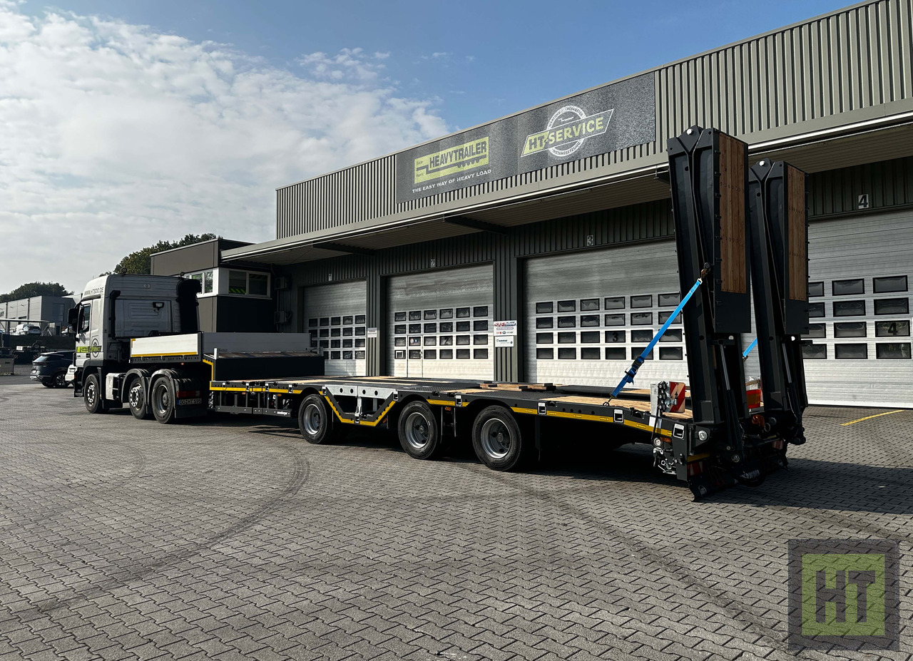 Meusburger 3-Achs-Tele-Semi mit 1 Paar Radmulden und hydr. Rampen - Low loader semi-trailer: picture 1 Meusburger 3-Achs-Tele-Semi mit 1 Paar Radmulden und hydr. Rampen - Low loader semi-trailer: picture 1