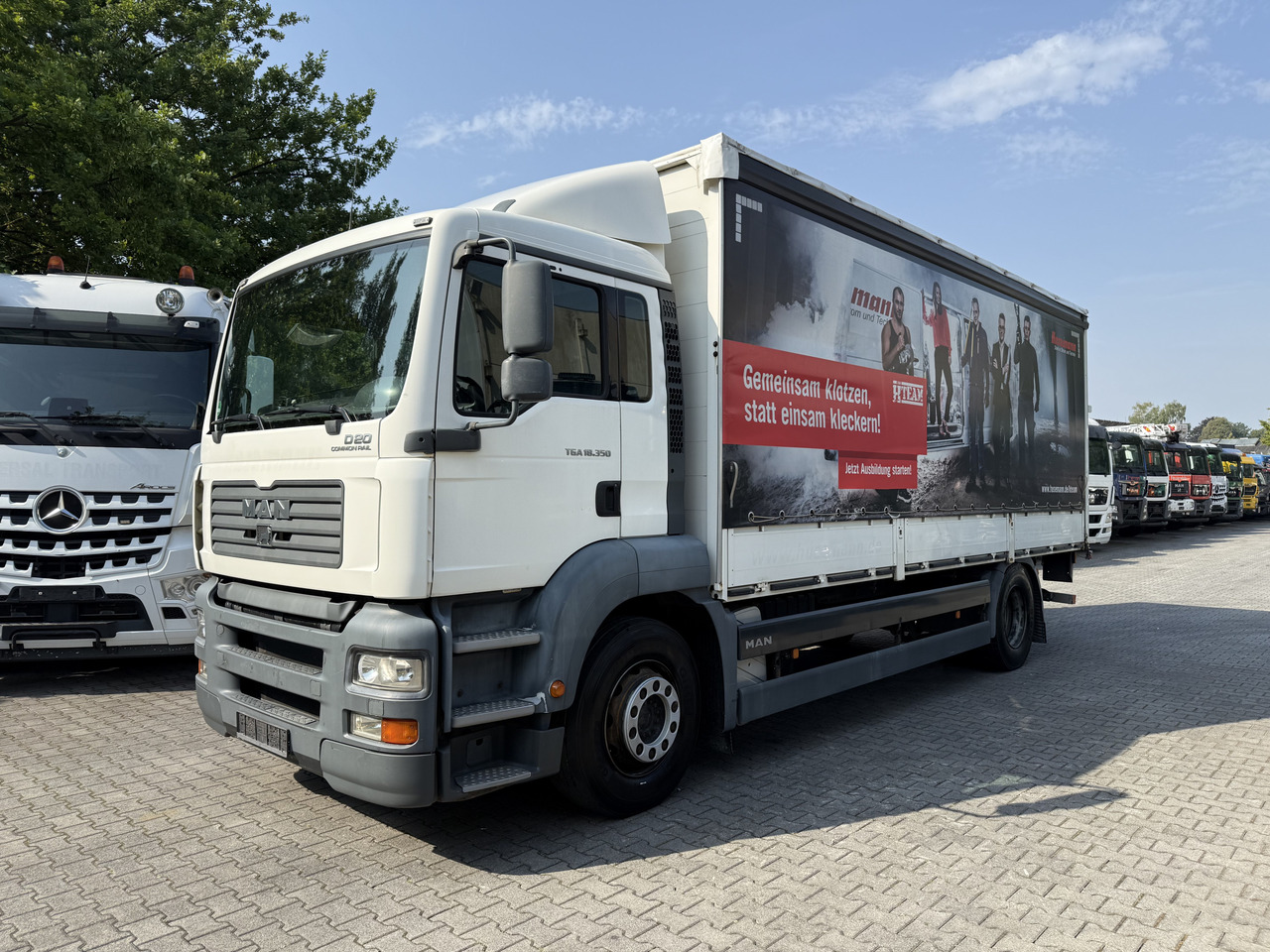 MAN TGA 18.350 4X2 BL Ladebordwand 4.000Kg - Curtainsider truck: picture 1 MAN TGA 18.350 4X2 BL Ladebordwand 4.000Kg - Curtainsider truck: picture 1