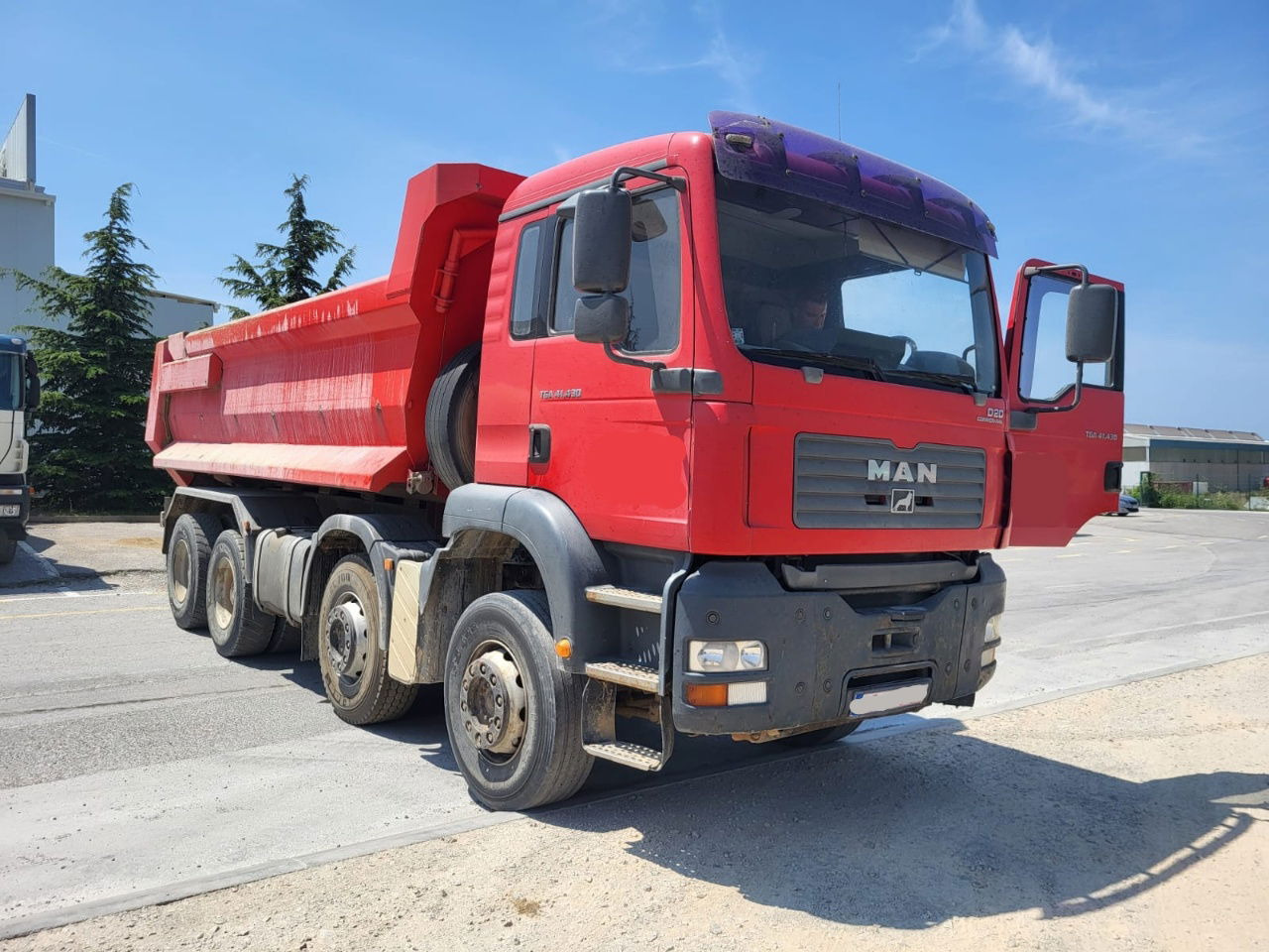 MAN TGA 41.430 8x4 meiller tipper - hydr. back site - Tipper: picture 2 MAN TGA 41.430 8x4 meiller tipper - hydr. back site - Tipper: picture 2