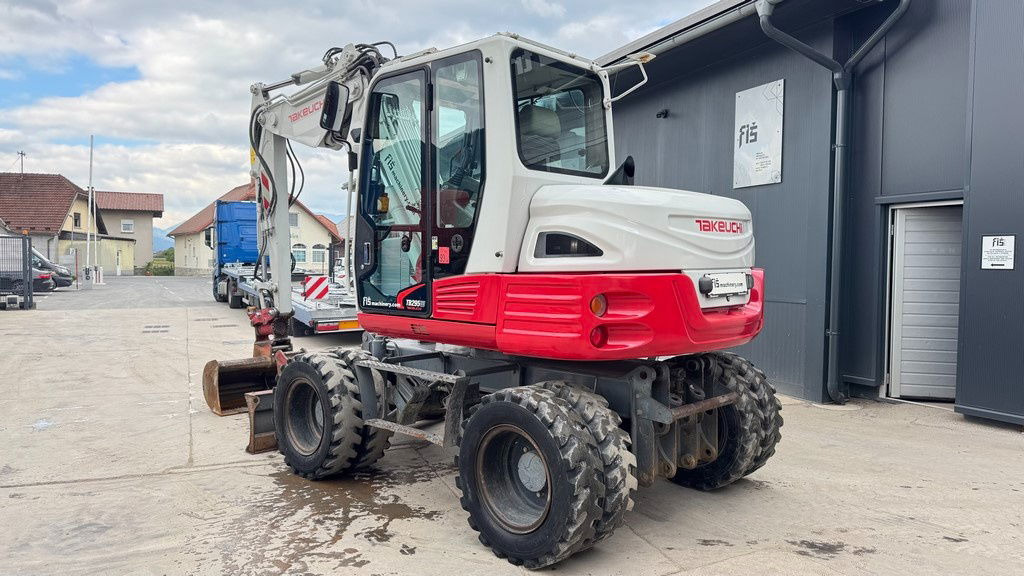 Takeuchi TB295W - 2014 Year - Powertilt - 3X Buckets - Wheel excavator: picture 3 Takeuchi TB295W - 2014 Year - Powertilt - 3X Buckets - Wheel excavator: picture 3