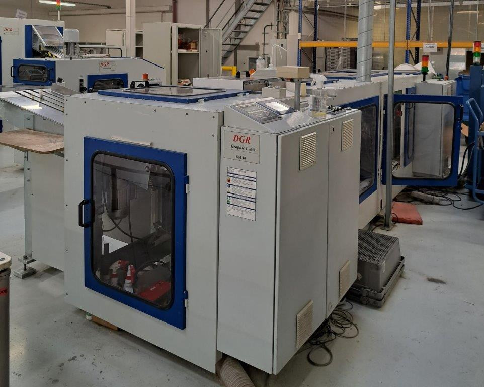 Book on Demand Perfect Binder - spine gluing station DGR Graphic KM 40 - Printing machinery: picture 1 Book on Demand Perfect Binder - spine gluing station DGR Graphic KM 40 - Printing machinery: picture 1