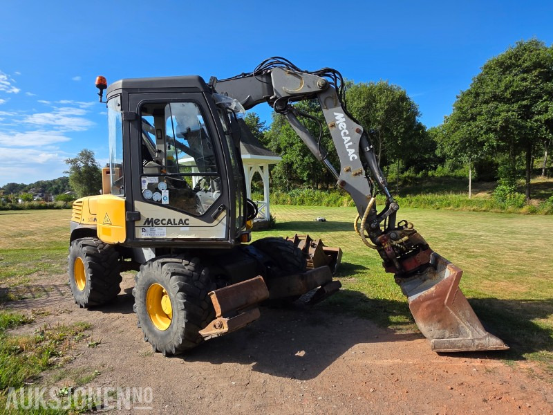 2006 Mecalac 12MXT gravemaskin/hjullaster med RT40 Rototilt - Graveskuff - Pusseskuff - Hjullasterskuff - Excavator: picture 1 2006 Mecalac 12MXT gravemaskin/hjullaster med RT40 Rototilt - Graveskuff - Pusseskuff - Hjullasterskuff - Excavator: picture 1