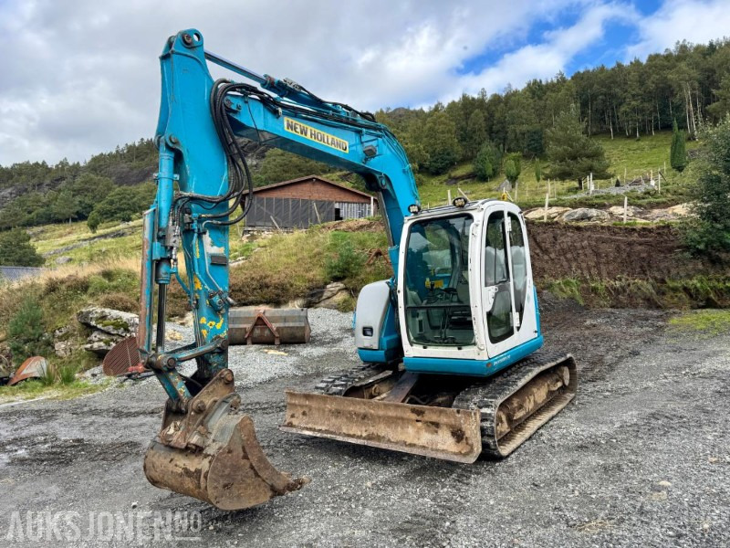 2008 New Holland E70SR-ES Gravemaskin - Tannskuffe - Grøfteskuffe - Pusseskuffe - Timer: 5746 - Mini excavator: picture 1 2008 New Holland E70SR-ES Gravemaskin - Tannskuffe - Grøfteskuffe - Pusseskuffe - Timer: 5746 - Mini excavator: picture 1