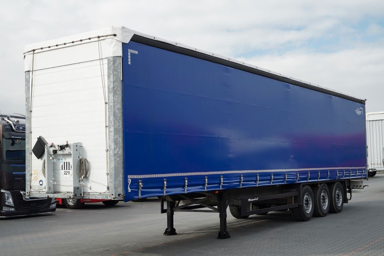 Schmitz Cargobull FIRANKA / STANDARD /  OS PODNOSZONA - Curtainsider semi-trailer: picture 1 Schmitz Cargobull FIRANKA / STANDARD /  OS PODNOSZONA - Curtainsider semi-trailer: picture 1