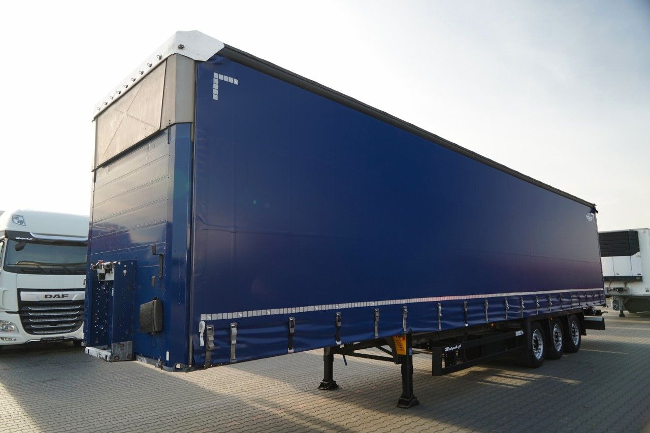 Schmitz Cargobull FIRANKA VARIOS / PODNOSZONY DACH HYDRAULICZNIE / - Curtainsider semi-trailer: picture 2 Schmitz Cargobull FIRANKA VARIOS / PODNOSZONY DACH HYDRAULICZNIE / - Curtainsider semi-trailer: picture 2