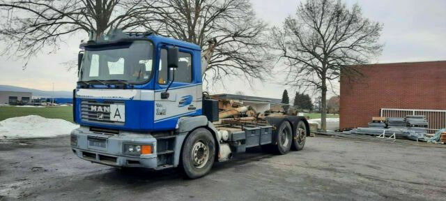 MAN 26.314K 6x2 Blatt/Luft Diff/Sperre - Hook lift truck: picture 1 MAN 26.314K 6x2 Blatt/Luft Diff/Sperre - Hook lift truck: picture 1