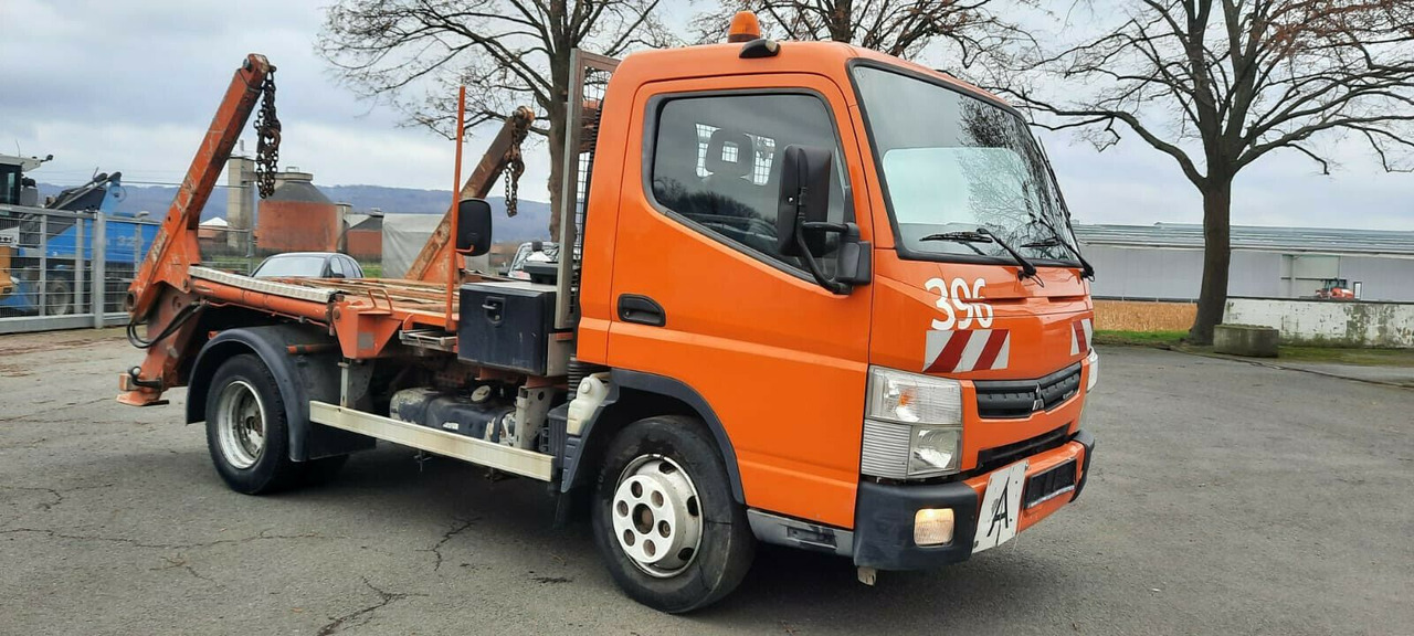 Mitsubishi Canter Absetzer Klima AHK Diff/Sperre - Skip loader truck: picture 1 Mitsubishi Canter Absetzer Klima AHK Diff/Sperre - Skip loader truck: picture 1