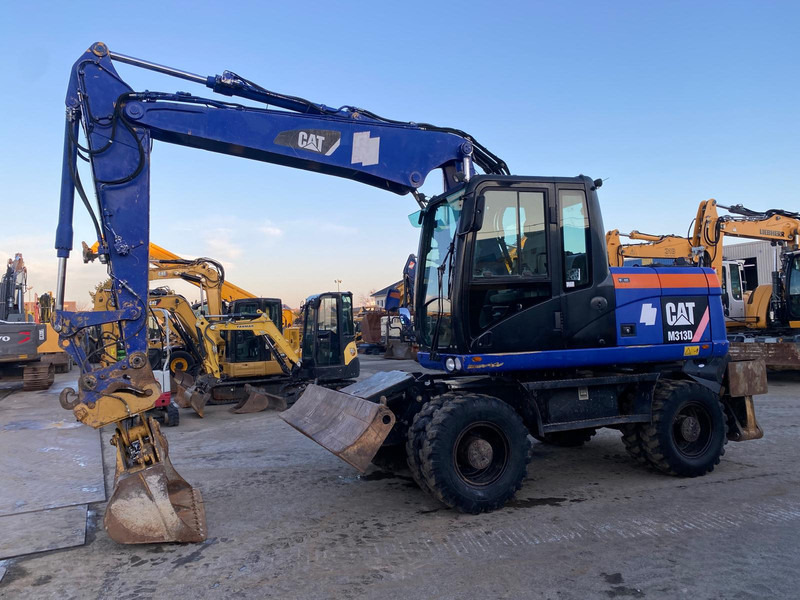 Caterpillar M313D NVT - Wheel excavator: picture 2 Caterpillar M313D NVT - Wheel excavator: picture 2