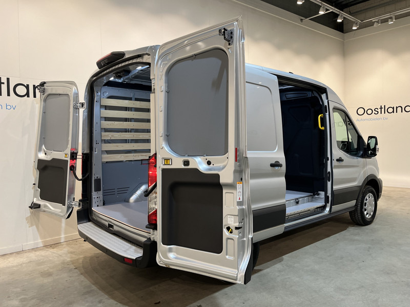 Ford E-Transit 350 L2H2 Trend 68 kWh 184 PK / 100% elektrisch !! / Airco / Cruise Control / CarPlay / Camera / Navigatie / 3-Zits / 900 KM !! Z.G.A.N. ! - Panel van, Electric van: picture 4 Ford E-Transit 350 L2H2 Trend 68 kWh 184 PK / 100% elektrisch !! / Airco / Cruise Control / CarPlay / Camera / Navigatie / 3-Zits / 900 KM !! Z.G.A.N. ! - Panel van, Electric van: picture 4