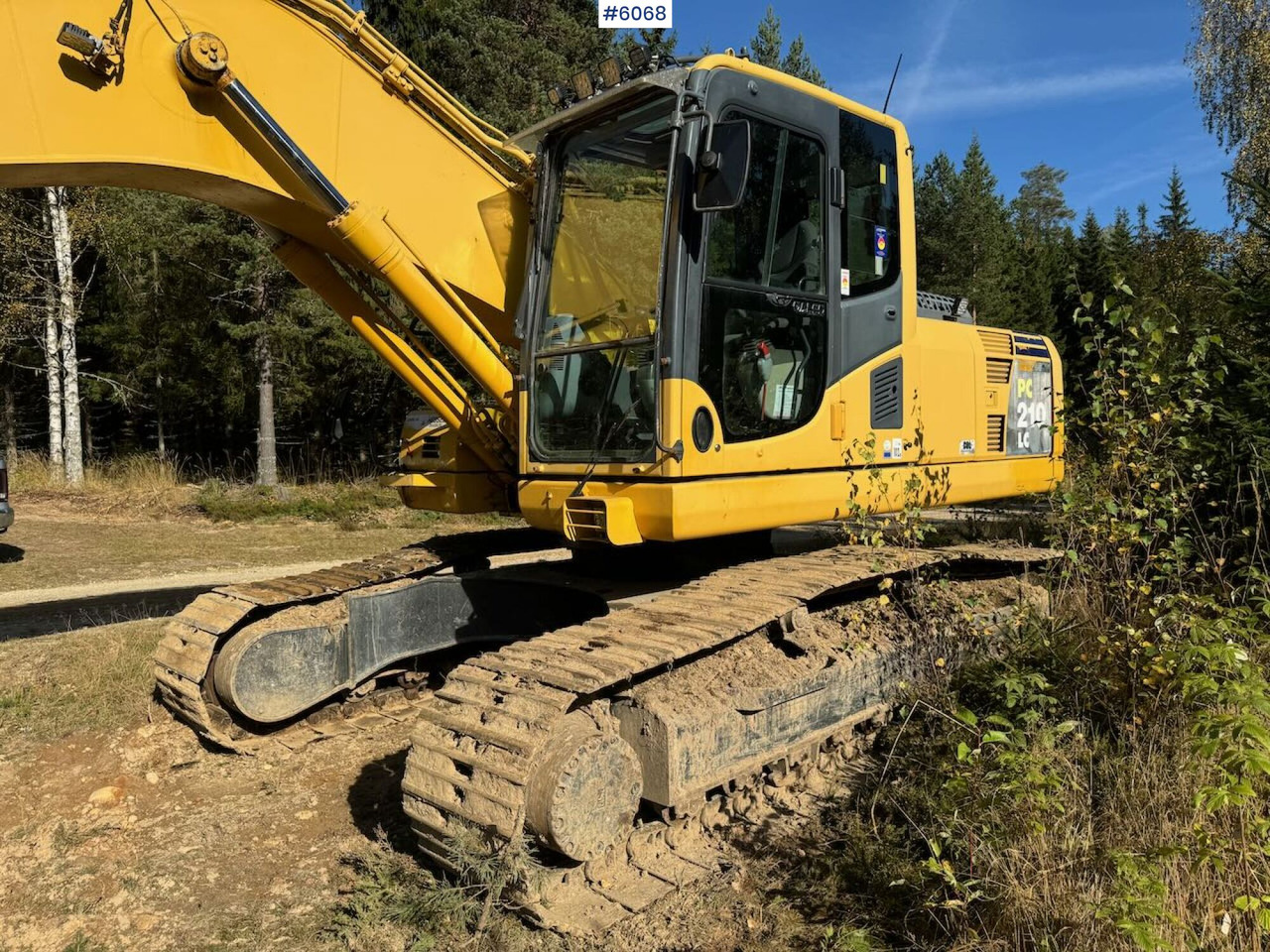 2007 Komatsu PC210LC Tracked Excavator with 3 buckets, tilt, grapple, and ripper. - Excavator: picture 1 2007 Komatsu PC210LC Tracked Excavator with 3 buckets, tilt, grapple, and ripper. - Excavator: picture 1