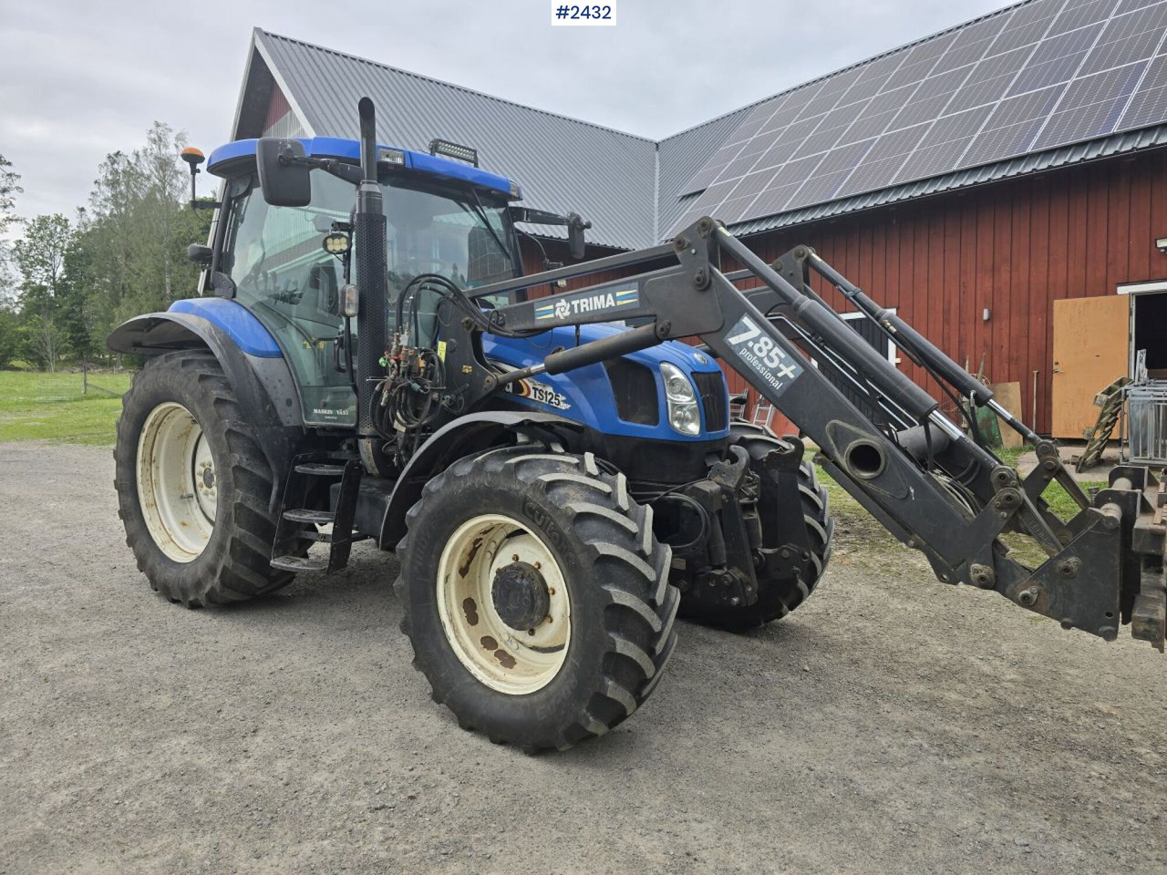 New Holland TS 125A med Frontlastare - Farm tractor: picture 2 New Holland TS 125A med Frontlastare - Farm tractor: picture 2