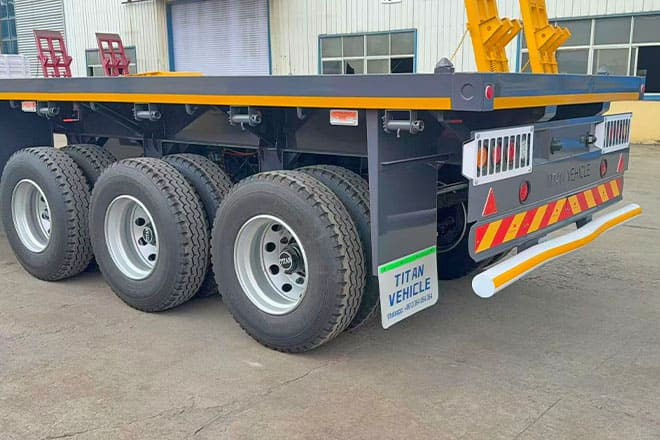 TITAN 3 Axle Flatbed Semi Trailer for Sale in Ghana - Dropside/ Flatbed semi-trailer: picture 3 TITAN 3 Axle Flatbed Semi Trailer for Sale in Ghana - Dropside/ Flatbed semi-trailer: picture 3