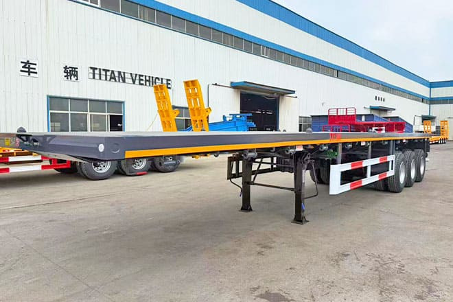 TITAN 3 Axle Flatbed Semi Trailer for Sale in Ghana - Dropside/ Flatbed semi-trailer: picture 1 TITAN 3 Axle Flatbed Semi Trailer for Sale in Ghana - Dropside/ Flatbed semi-trailer: picture 1