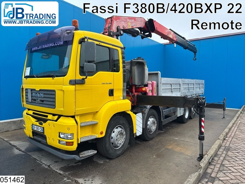 MAN TGA 35 400 8x2, Handgeschakeld, Fassi, Remote - Dropside/ Flatbed truck, Crane truck: picture 1 MAN TGA 35 400 8x2, Handgeschakeld, Fassi, Remote - Dropside/ Flatbed truck, Crane truck: picture 1